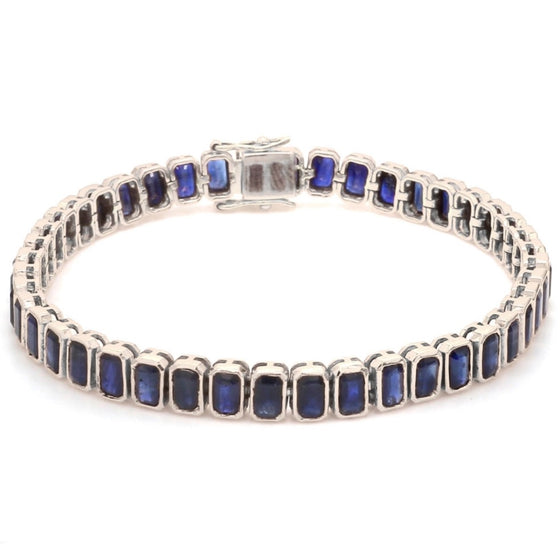 BLUE SAPPHIRE (EMERALD-CUT) BEZELED TENNIS BRACELET