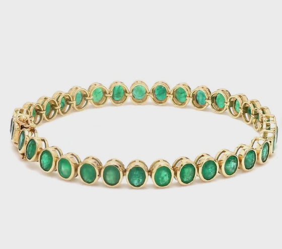 EMERALD BEZELED (OVAL-CUT) TENNIS BRACELET