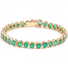 EMERALD BEZELED (OVAL-CUT) TENNIS BRACELET